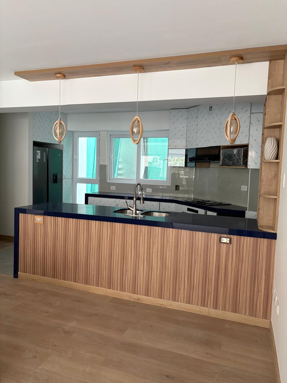 Kitchen — island with wooden bar