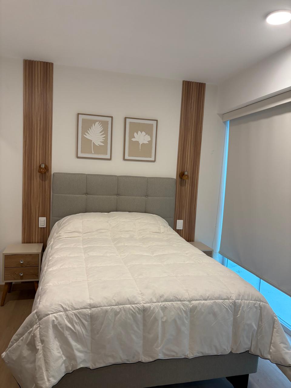 Bedroom — art above the headboard
