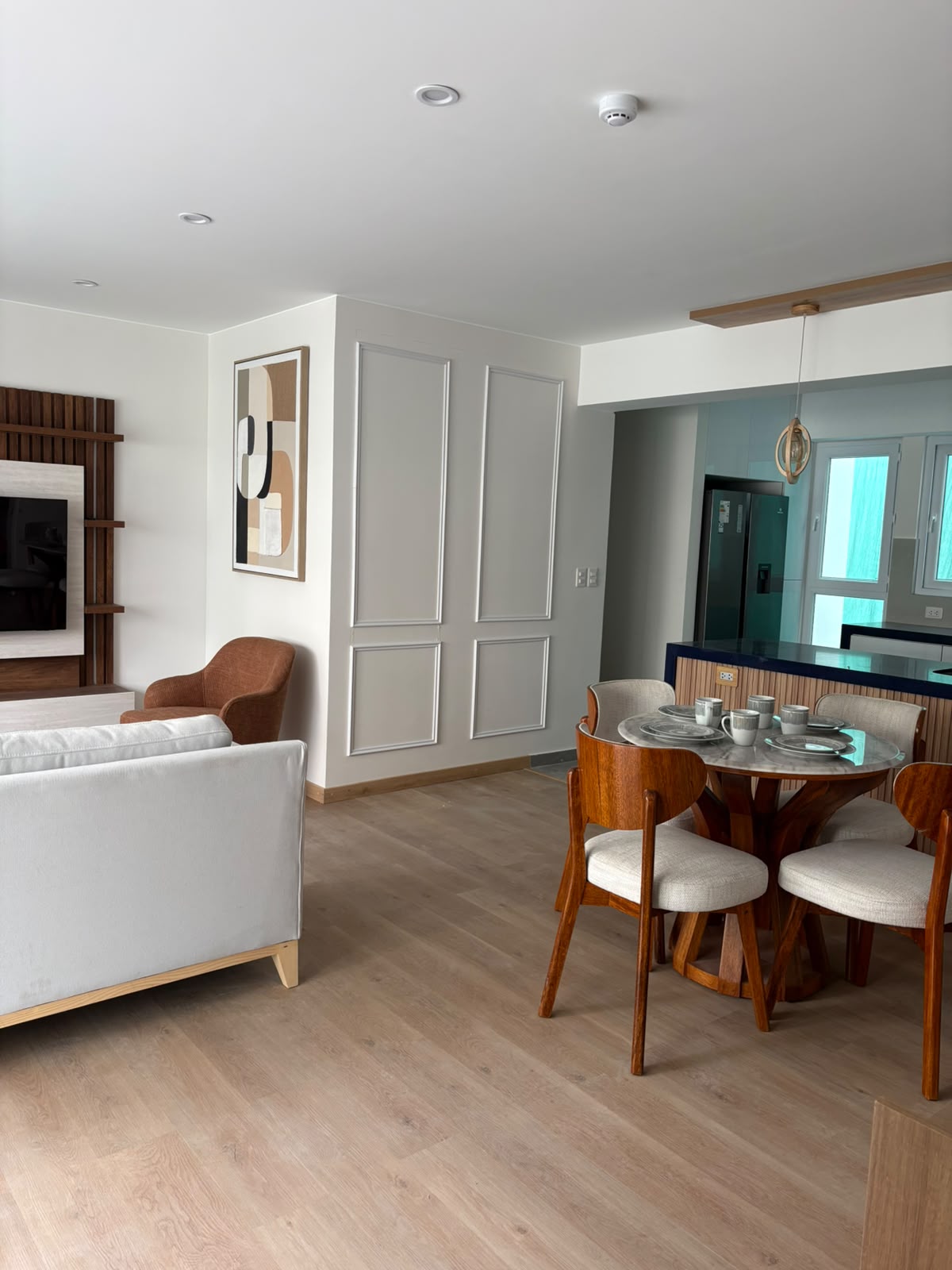 Living-dining — kitchen beyond